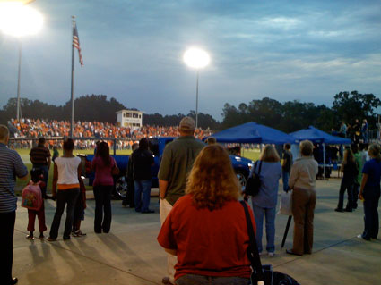The National Anthem brought everyone to their feet at the game.